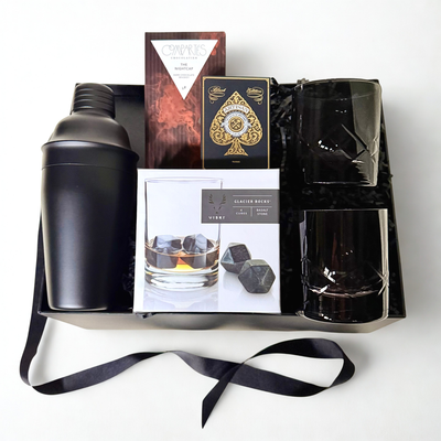 gift box with black shaker, whiskey dark chocolate, black artisan playing cards, 2 visky black cocktail glasses, viski glacier rocks