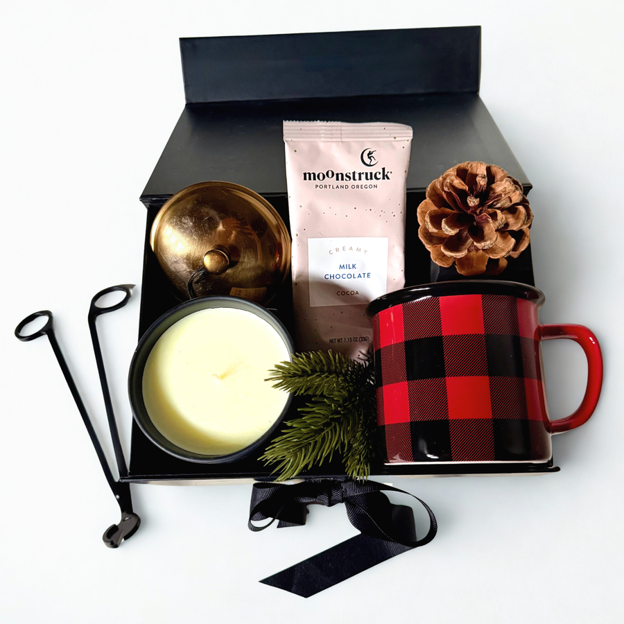 Cozy Fireside Gift Box with candle, plaid mug, wick trimmer, and hot chocolate packet.