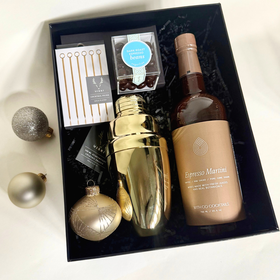 Gift box with gold shaker, sugarfina espresso beans, cocktail picks, and espresso martini mix
