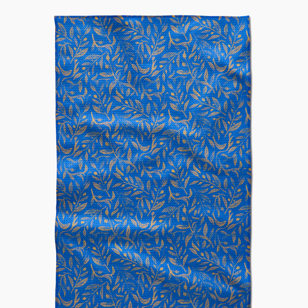Blue kitchen towel with gold hanukkah leaves