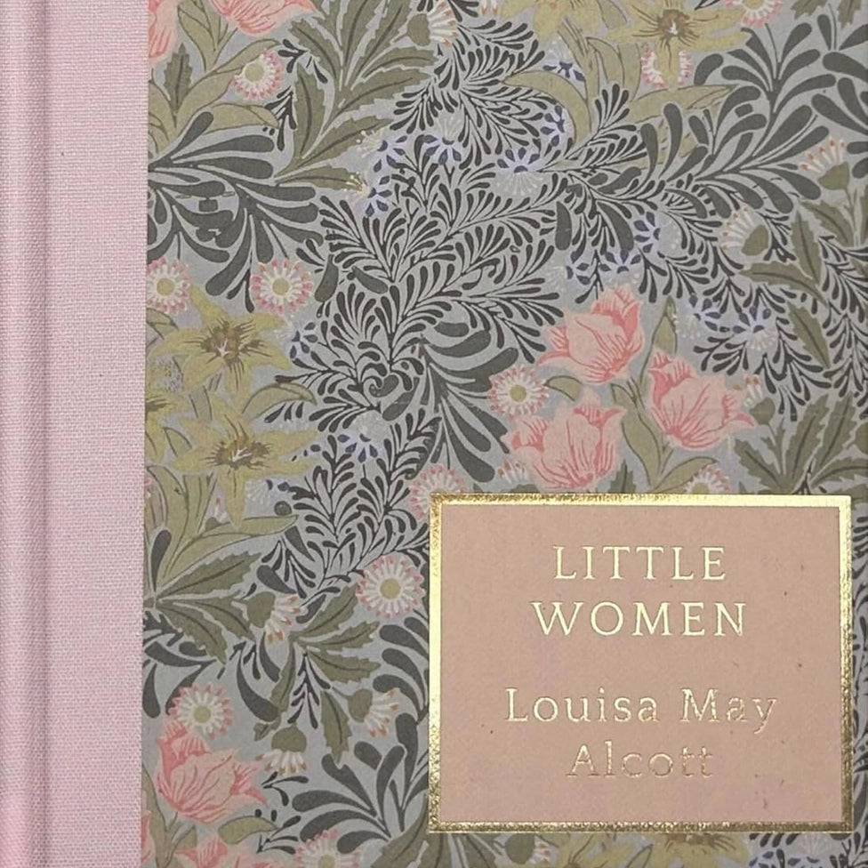 Book cover with floral design and 'Little Women' title