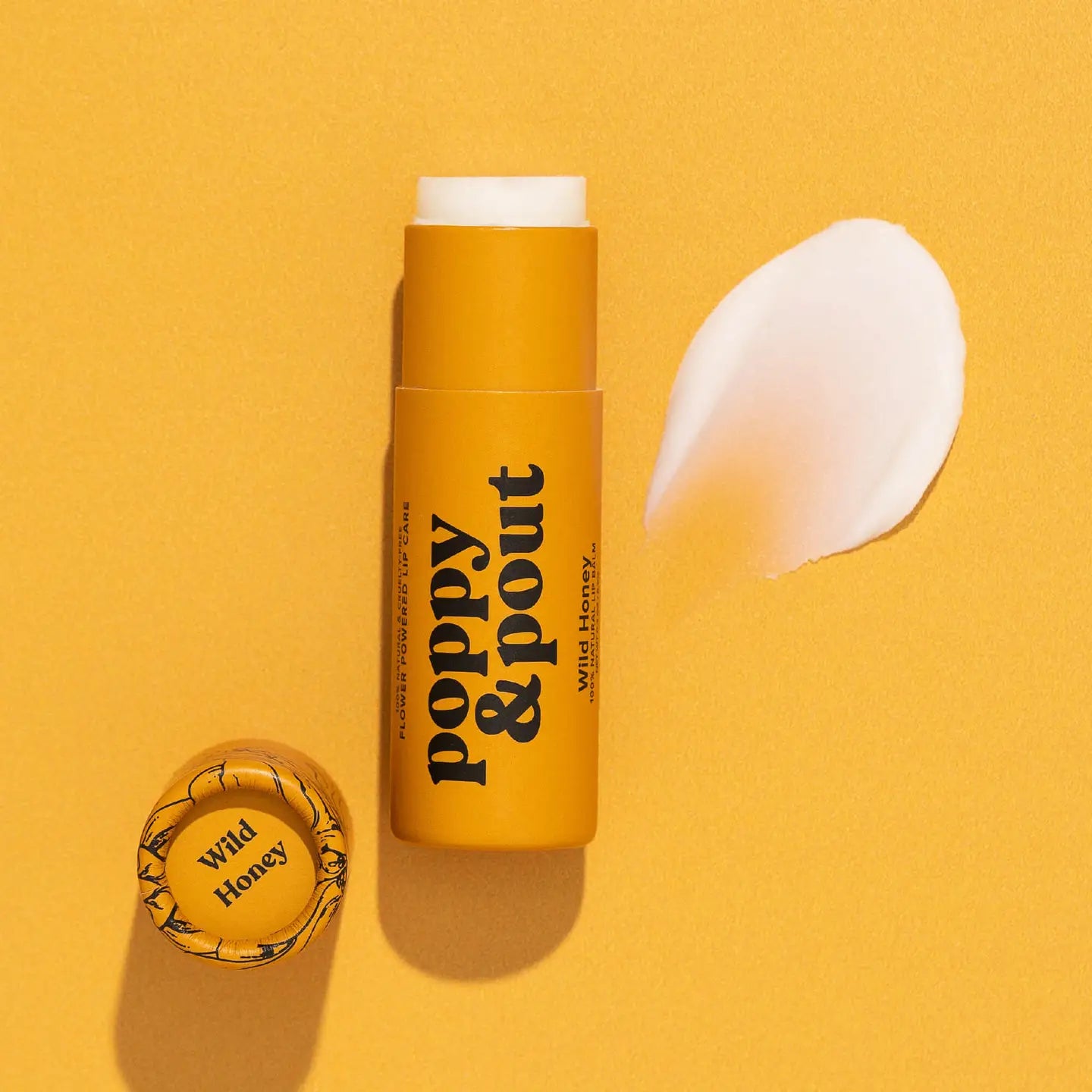 Yellow wild honey lip balm stick by 'Poppy & Pout' branding