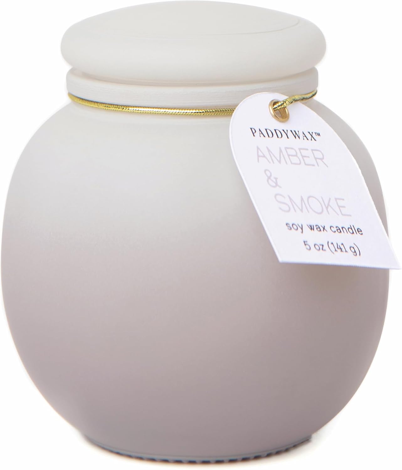Paddywax candle with a white lid and label on a white background
