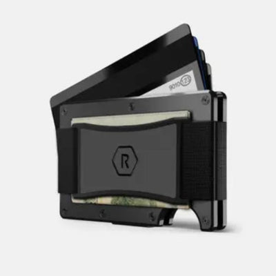 Black wallet with card slots and money clip on a light gray background