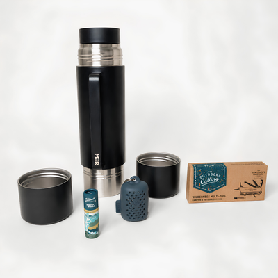 Black insulated thermos and mugs, with accessories on a white background